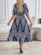 Selina – Geometric Flow Midi Dress