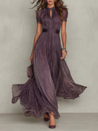 Flavia | Elegant long purple dress with a drop neckline and lace