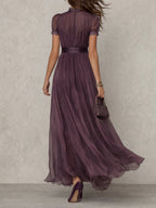 Flavia | Elegant long purple dress with a drop neckline and lace